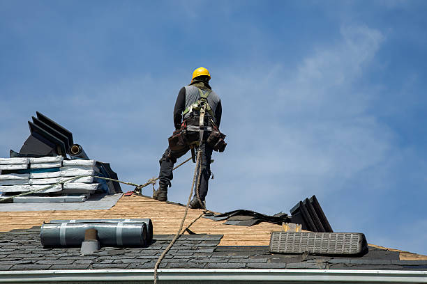 Professional Roofing technician working in Woodbine, MD
